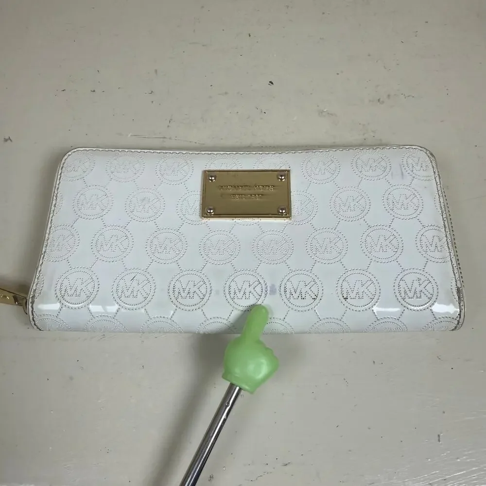 Michael Kors Contential MK Mono Mirror White Metallic zip around long wallet